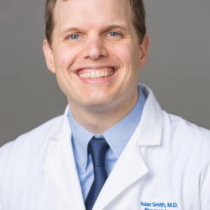 Photo of Isaac Smith, MD. He is a Career Development Award Scholar for REACH Equity, part of Cohort 5 for 2022 to 2024.